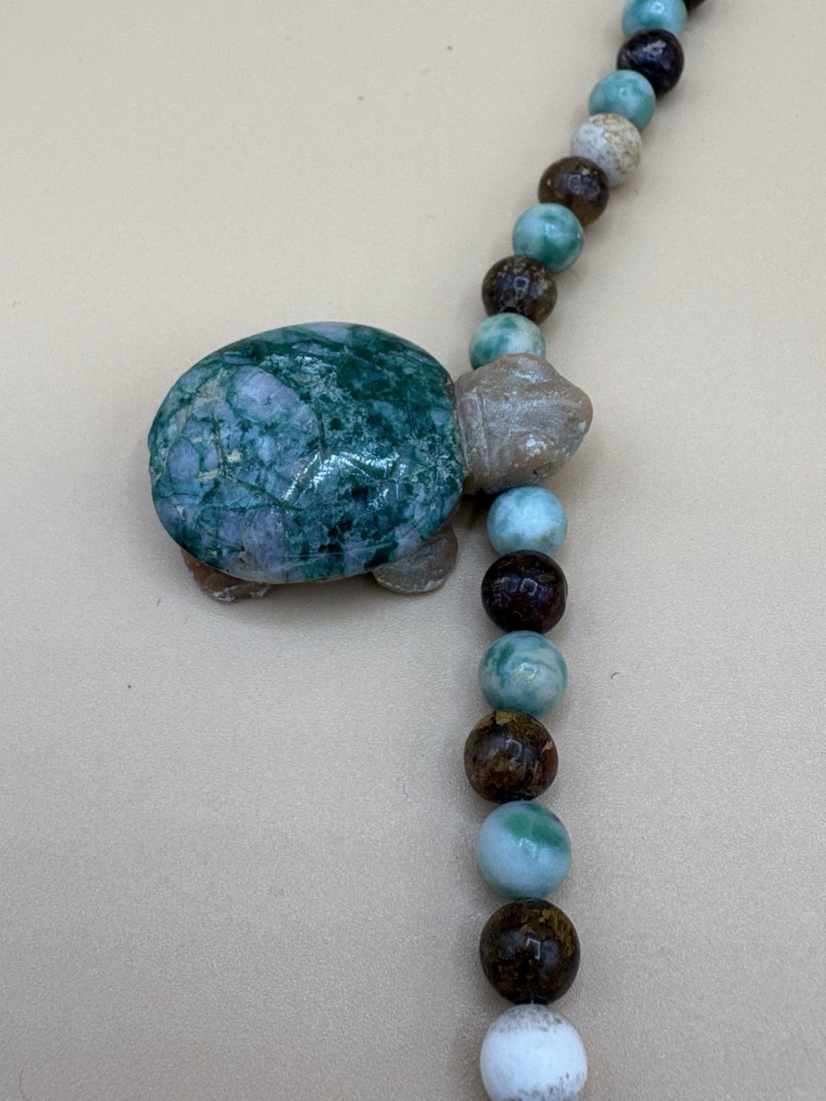 Assorted Color Stone Bead Necklace with 5 Carved Turtle Pendants