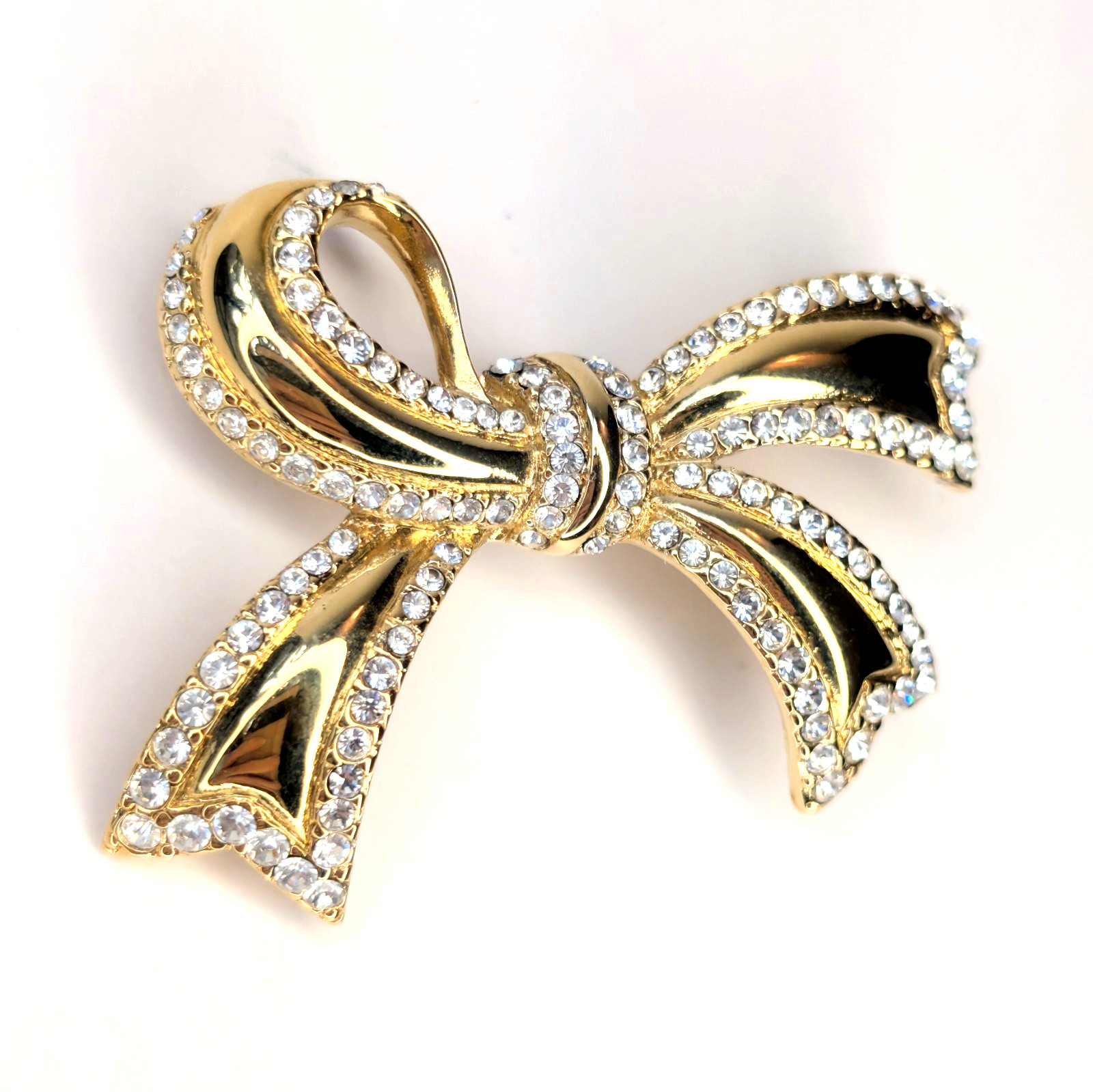 Vintage Monet Bow Brooch Gold-tone Plated Pave Clear Crystals 1980s–1990s