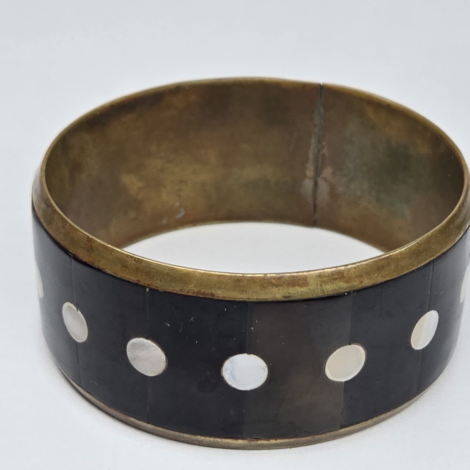 Vintage 8 Inch Gold Tone Metal Black Stone And White Shell Inlay Bangle Bracelet