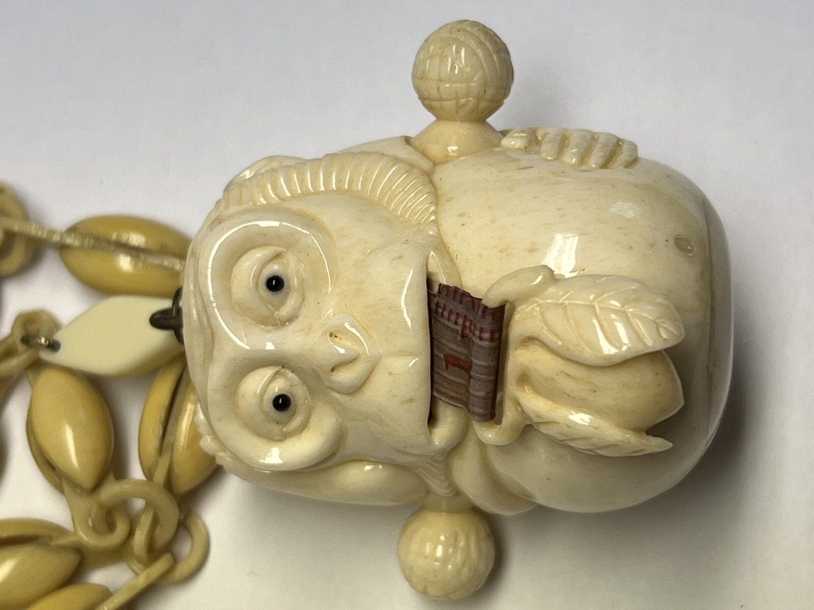 ANTIQUE ART DECO MONKEY NECKLACE TAPE MEASURE CELLULOID CHAIN PENDANT WHIMSICAL