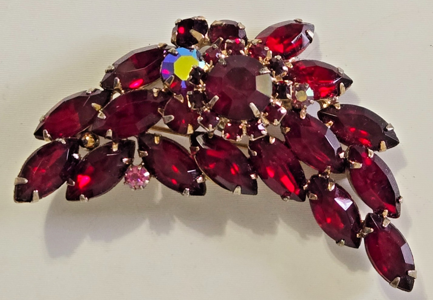 Vintage Brooch. Goldtone with Dark Red Stones. Pink Accent Stones. Gorgeous.