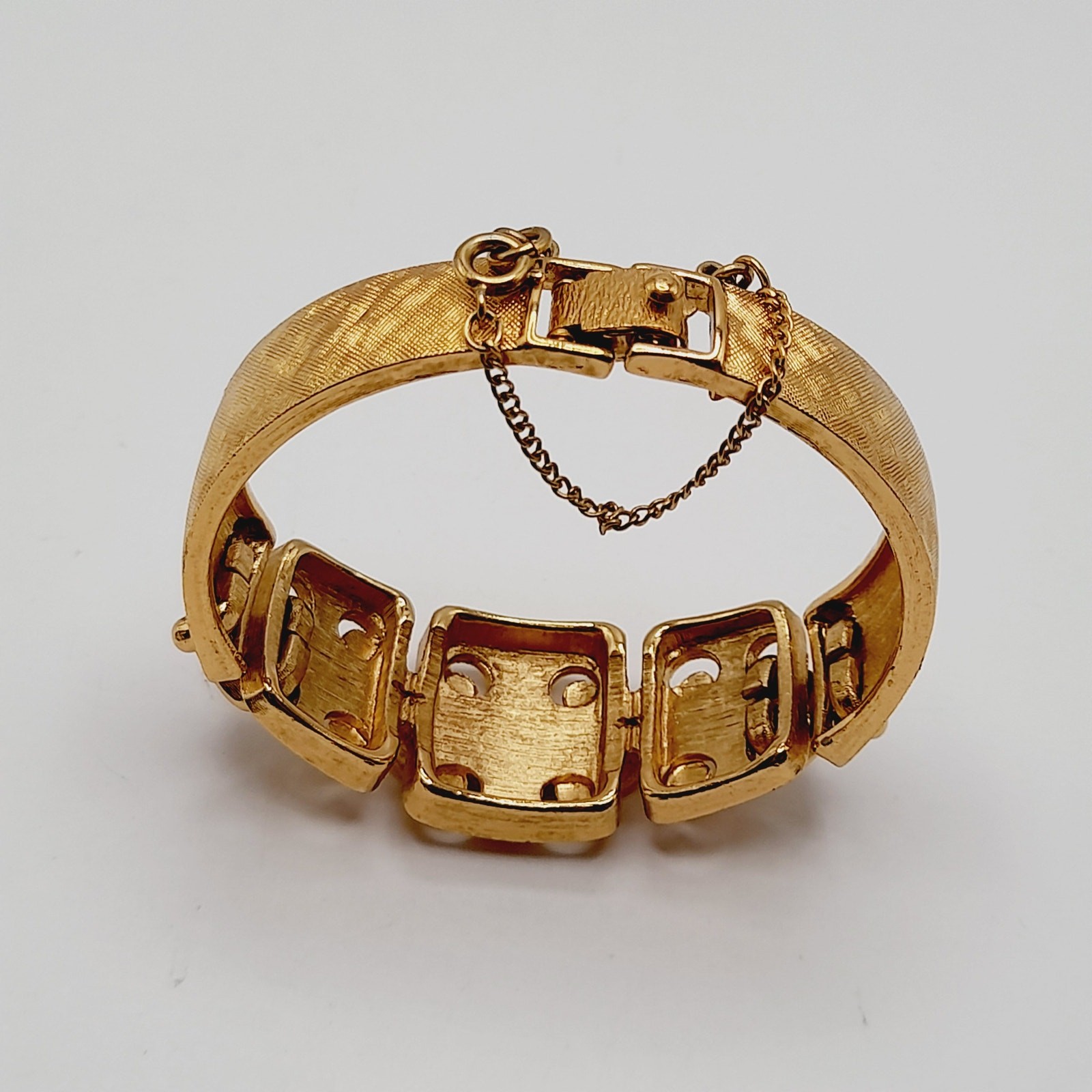 Vintage Monet Gold Tone Panel Bracelet Fold Over Clasp Safety Chain