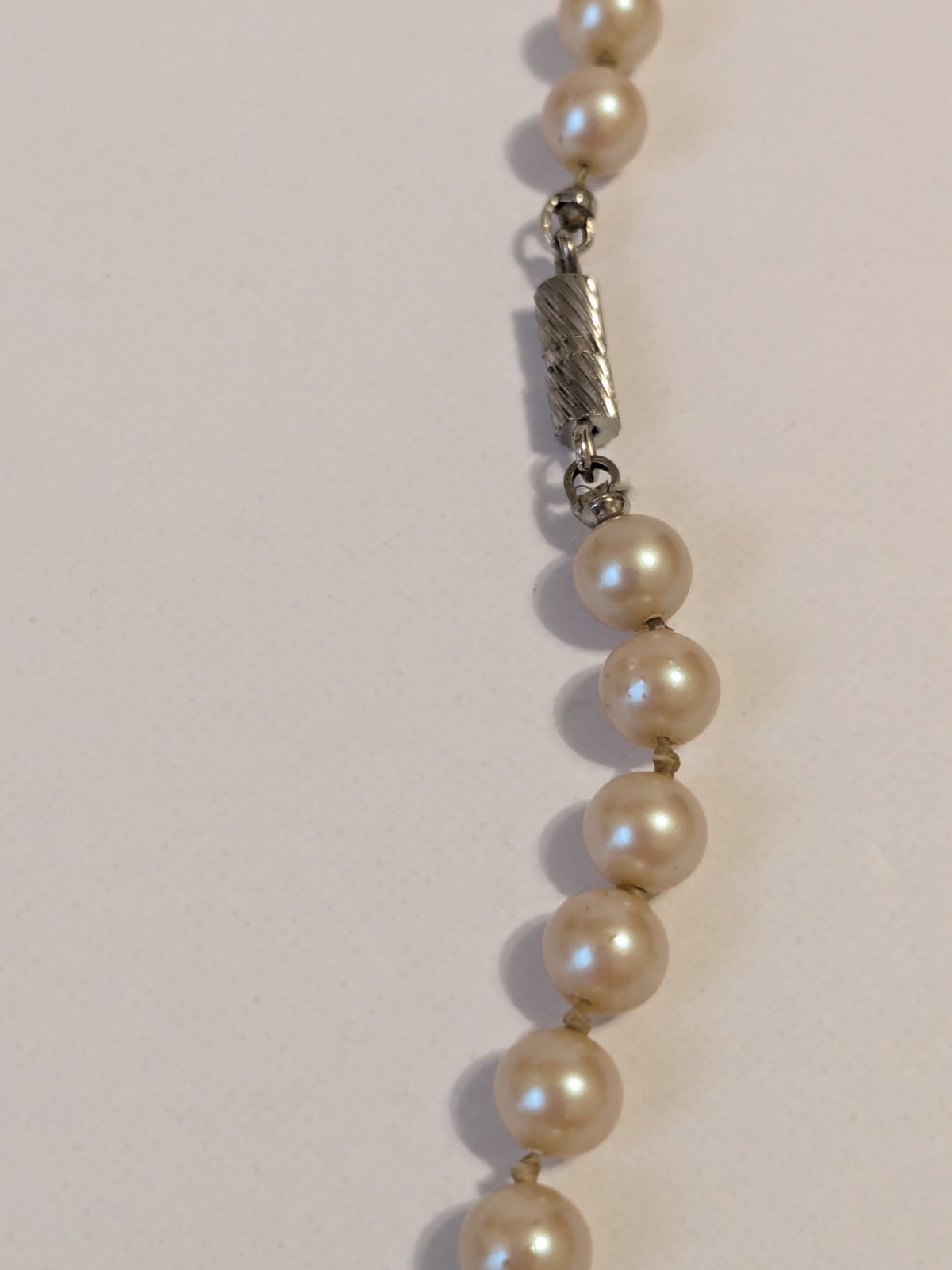 Faux Pearl Vintage Hand Knotted Necklace. Champagne. Barrel Closure 15″.