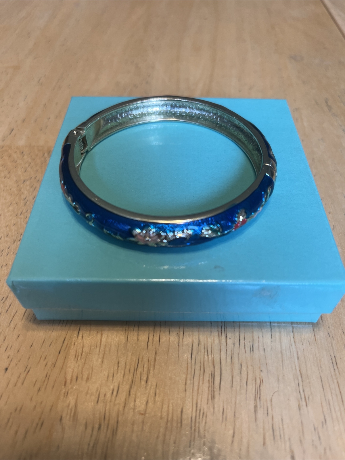 2 Gold Tone Enamel Bracelets Red (Marked Napier ) and Blue (not sure see pics)