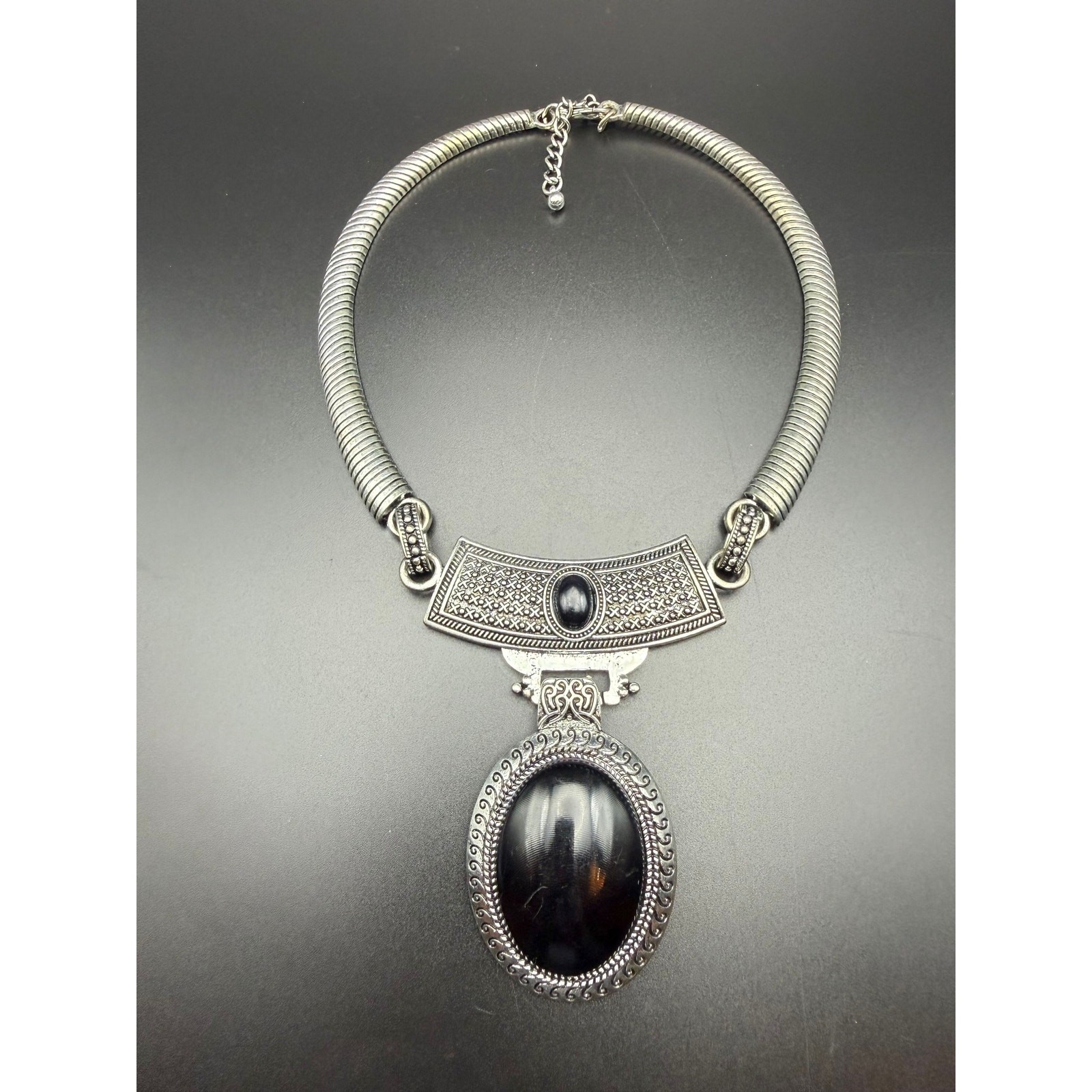 Vintage style silver-tone necklace with black enamel pendant