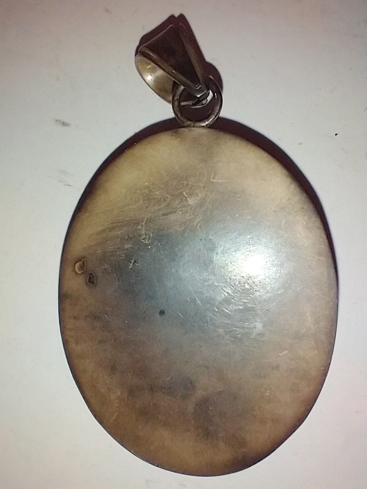 Old Cameo pendant 1.5 x 2 inches Almost looks like she has two faces
