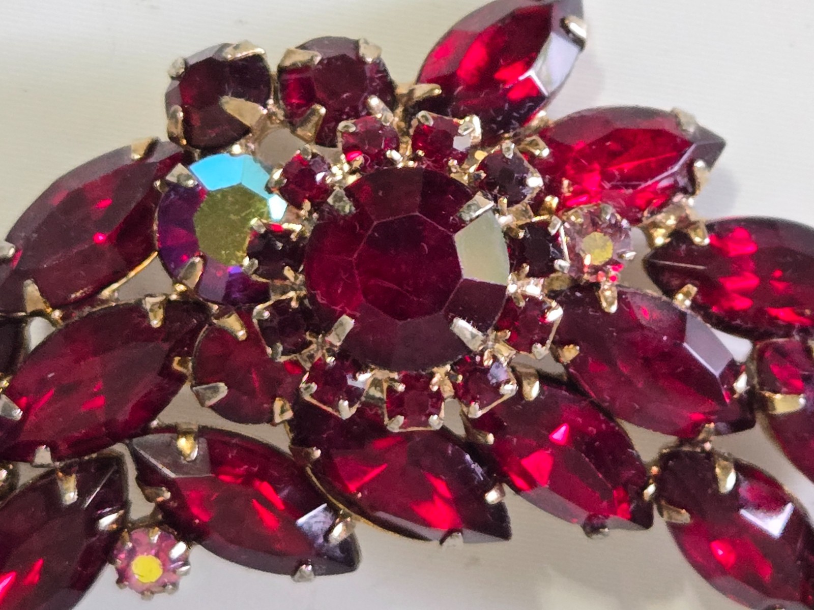 Vintage Brooch. Goldtone with Dark Red Stones. Pink Accent Stones. Gorgeous.