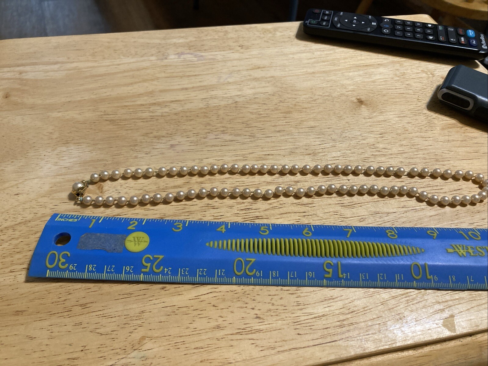 Vintage Trifari Faux Pearl Necklace. 22 Inches. Signed. Knotted