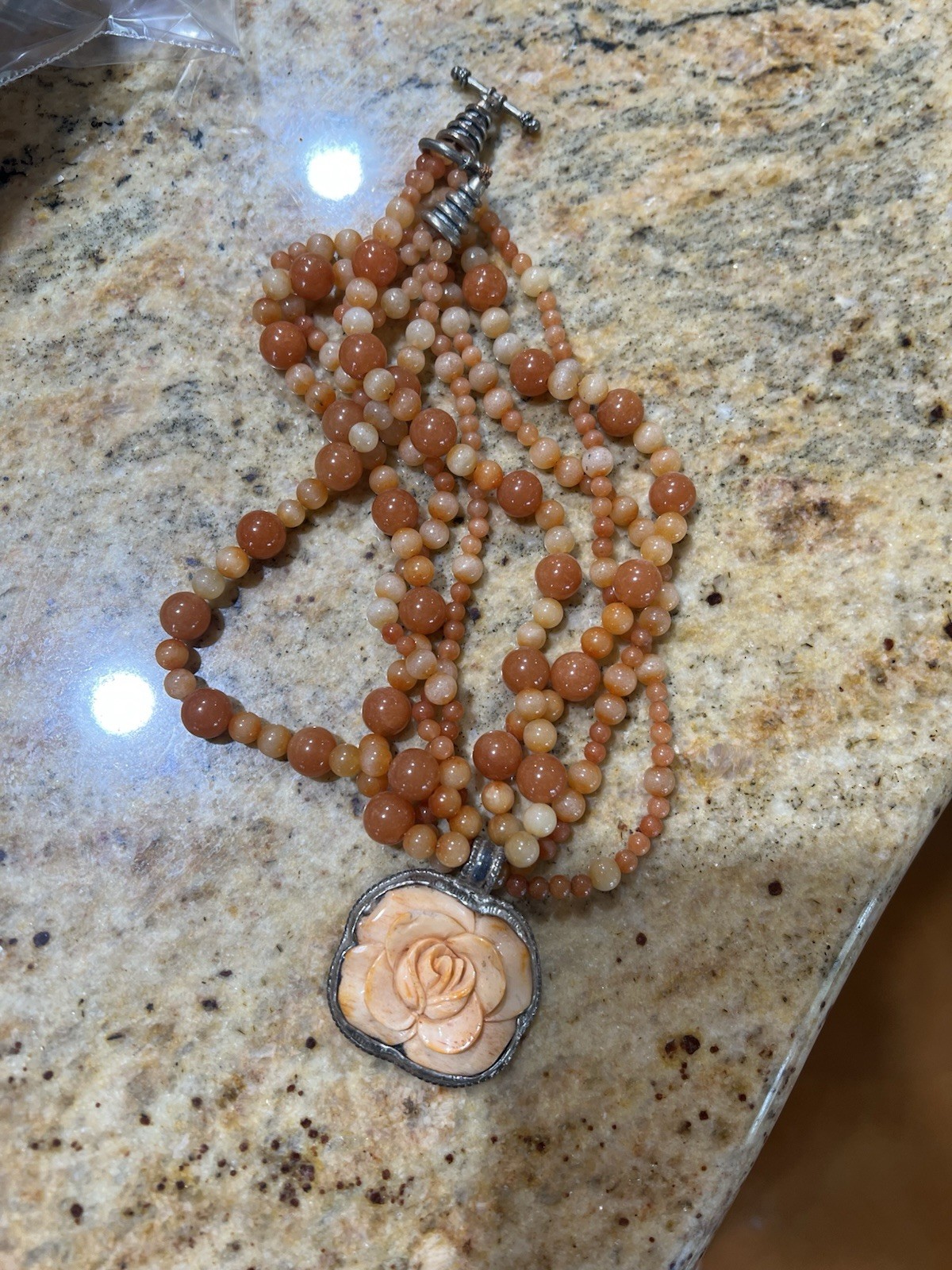 Stone And Carved Shell Orange Necklace