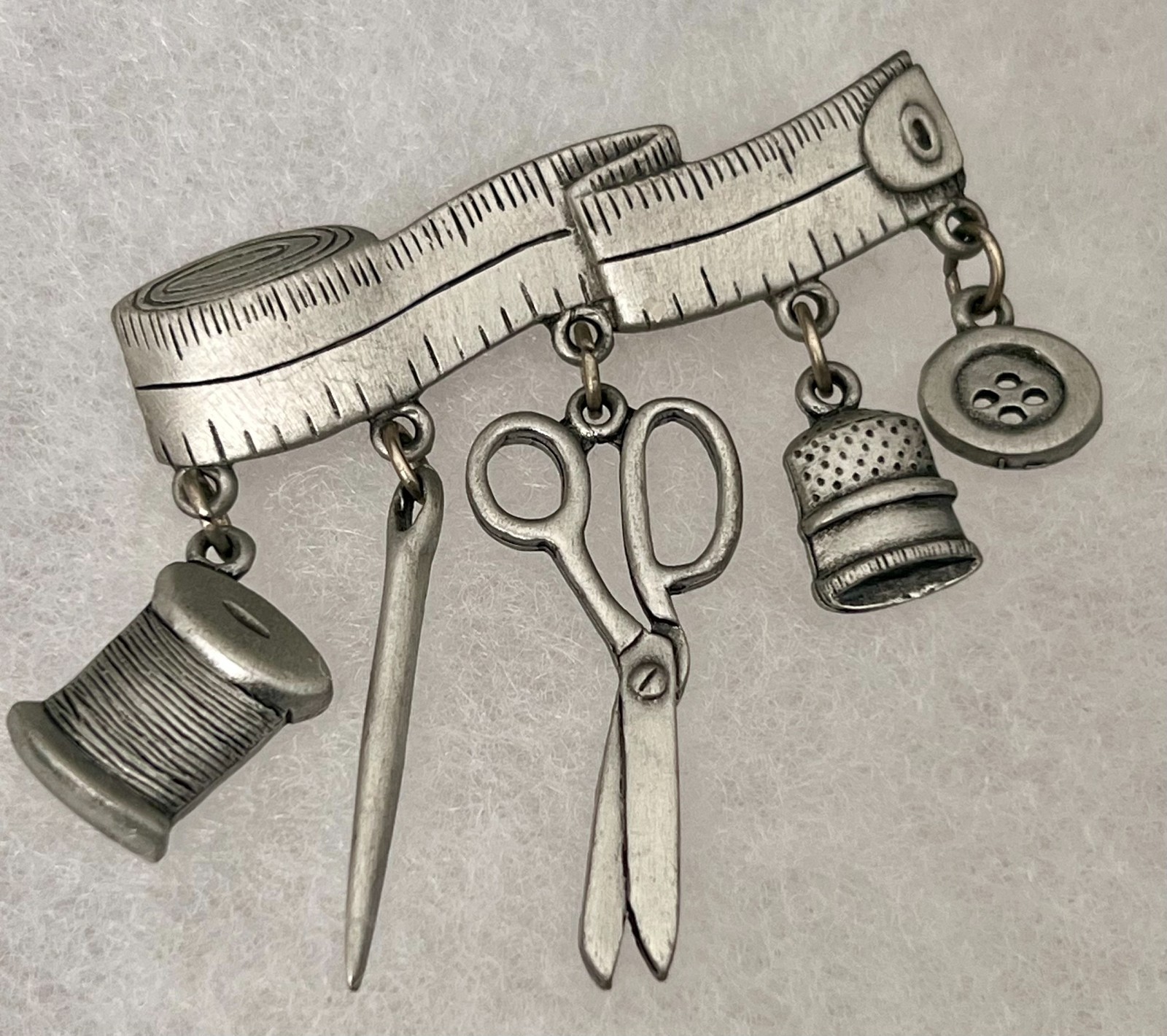 Vintage 80s Sewing Brooch Charms on Tape Measure Signed JJ Silver Tone Lapel Pin