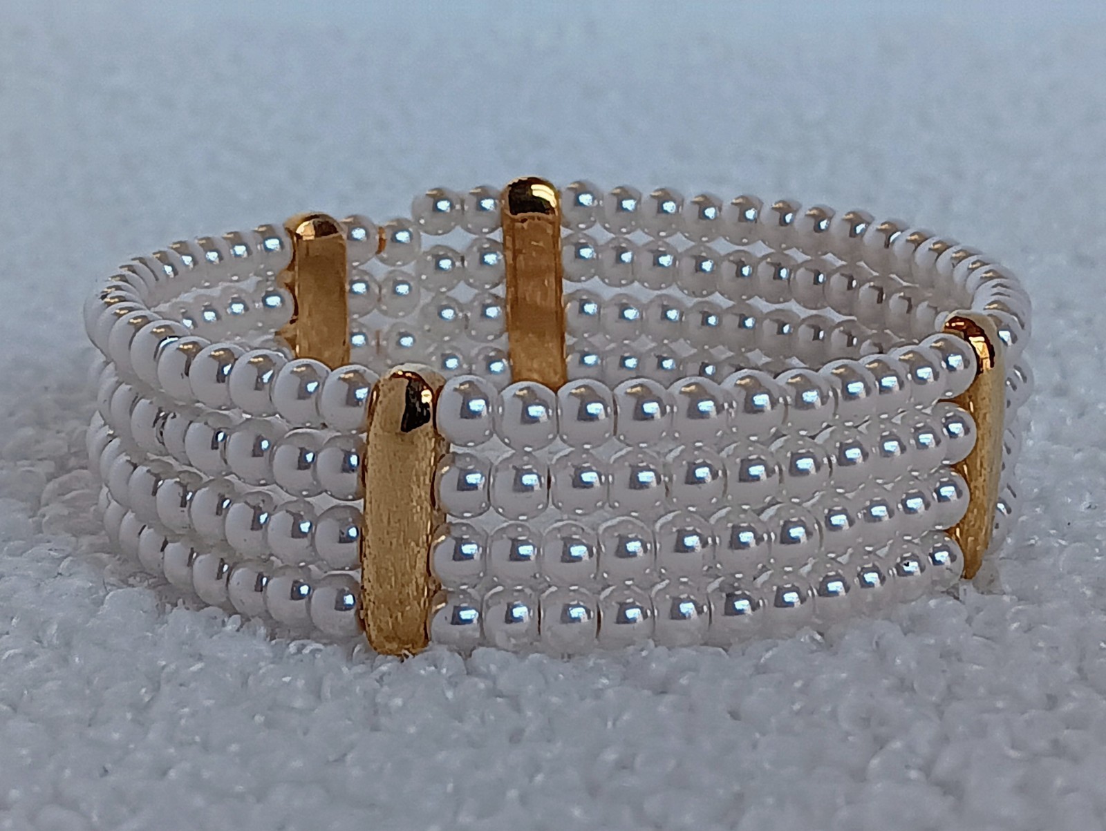 Vintage 4 Strand Faux Pearl Goldtone Tension Cuff Bracelet 7.5 in