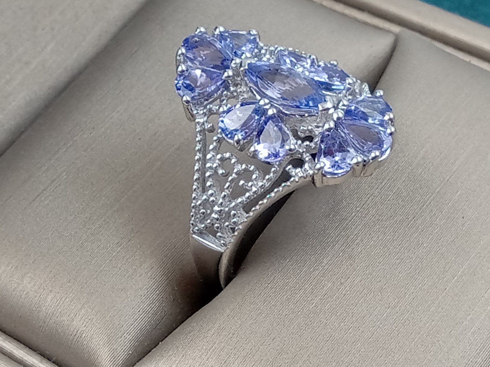 Sterling Silver Size 8 Ring w. Intricate multiple Iolite Gemstones Setting