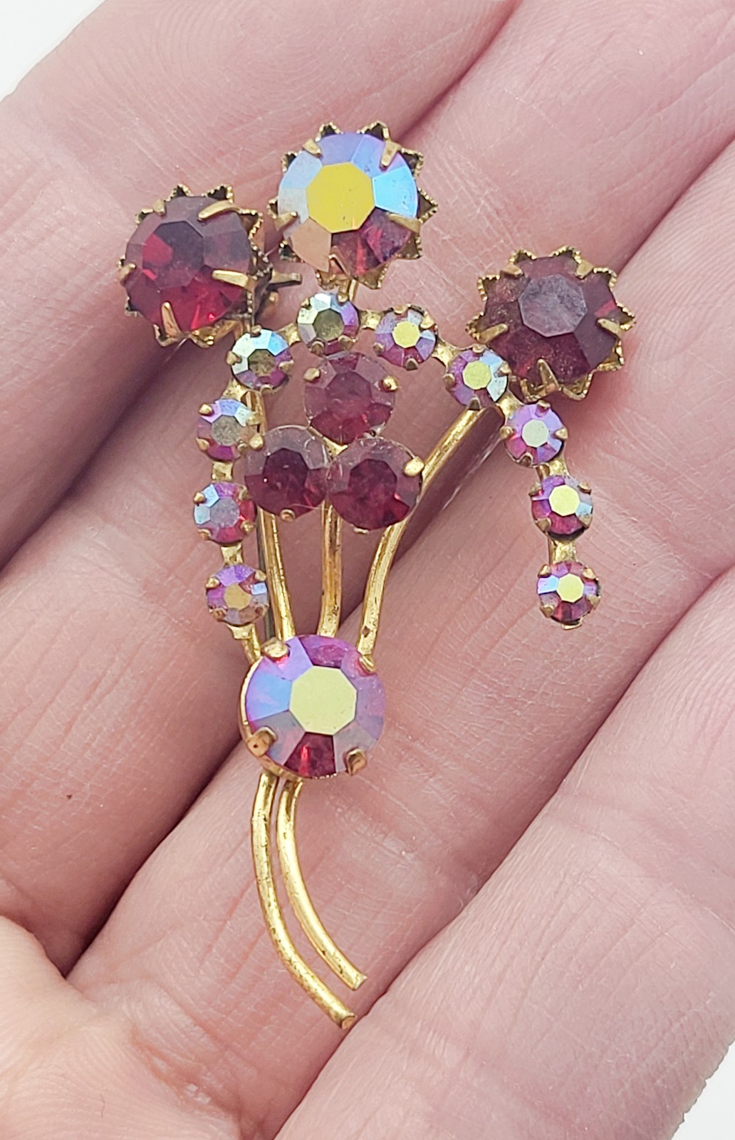 Vintage 2″ crystal pin, red and red iridescent stones