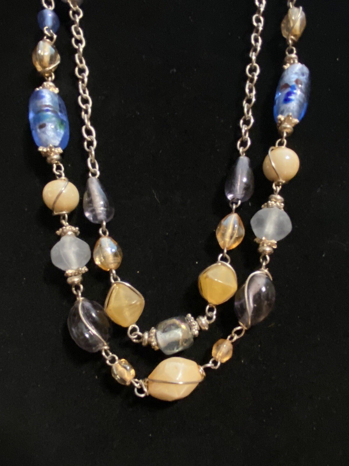 Blue, Purple, Beige, Off White, And Silver Multi-strand Glass Necklace