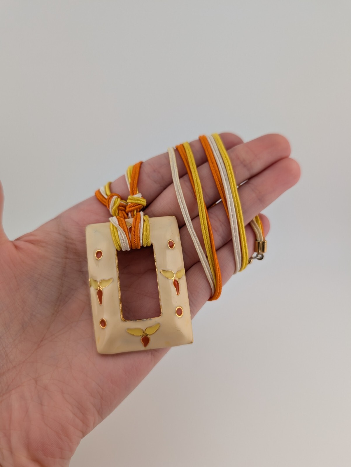 Vintage Gold Tone Fabric String Rectangle Cream Orange Enamel Pendant Necklace