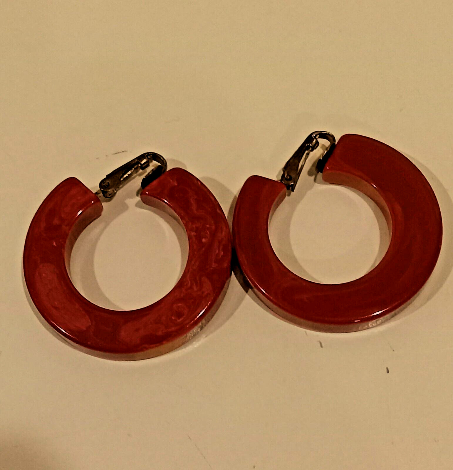 Vintage lovely bakelite hoop earrings appx. 1 1/2 ” across