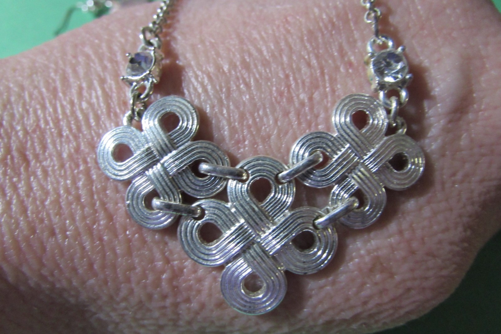LMN 17″ necklace and almost 2″ pierced earring set silvertone swirl w/rhinestone