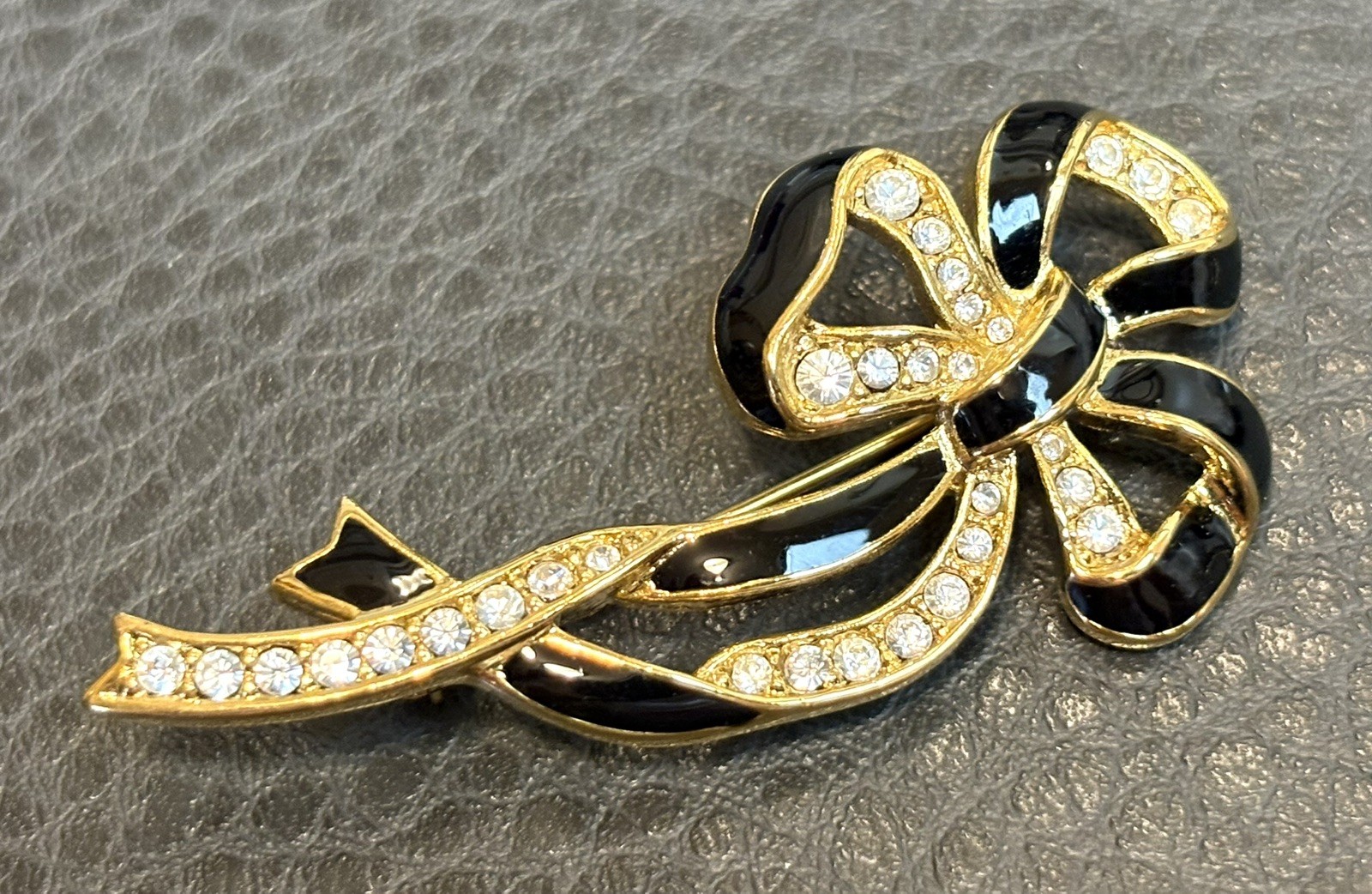 Vintage 80s Runway Gold Tone Rhinestone Black Enamel Ribbon Bow Brooch Pin