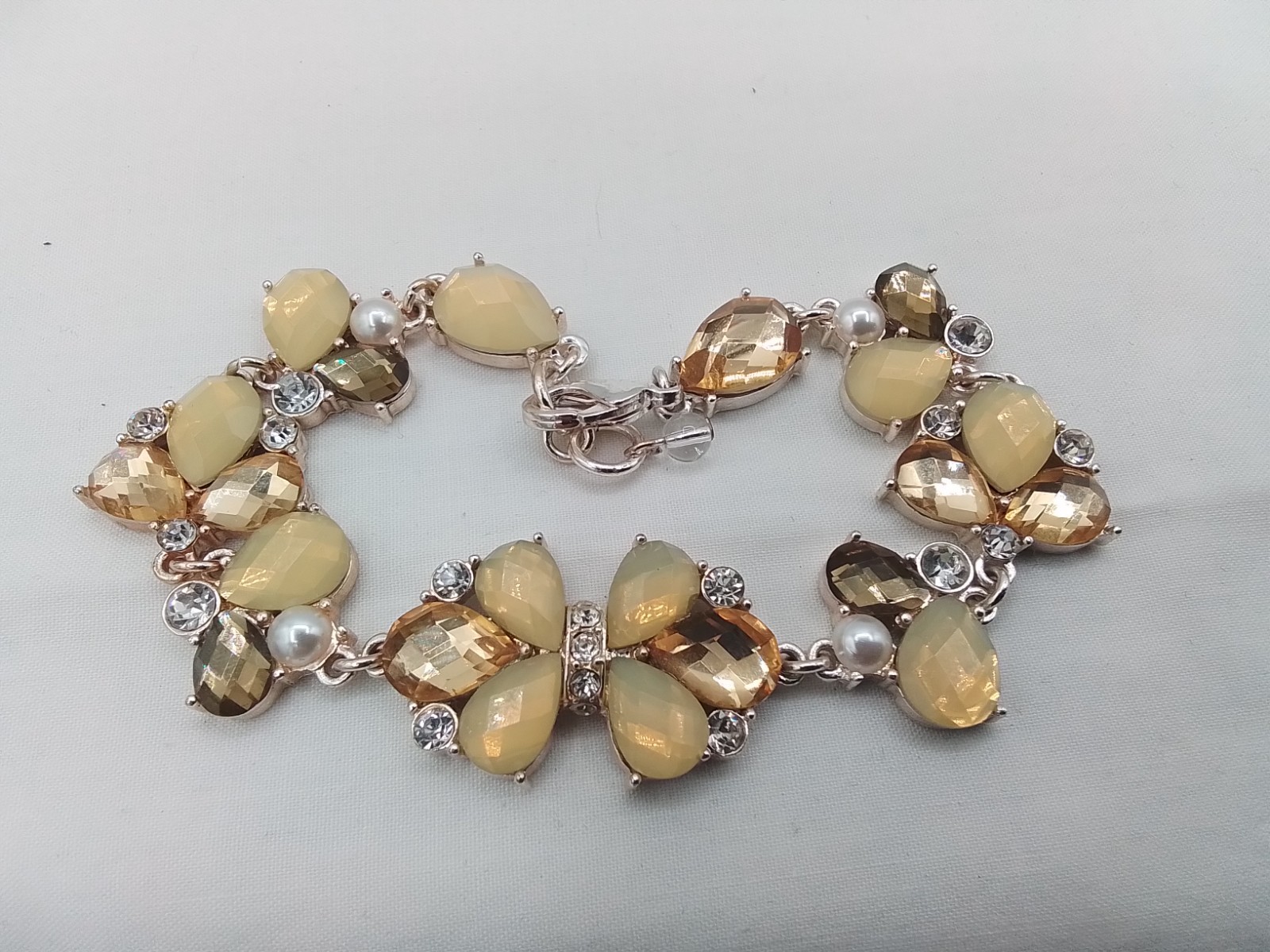MILKY YELLOW FACETED HONEY-HUED MORPHO BUTTERFLY INSECT MOTIF TENNIS BRACELET