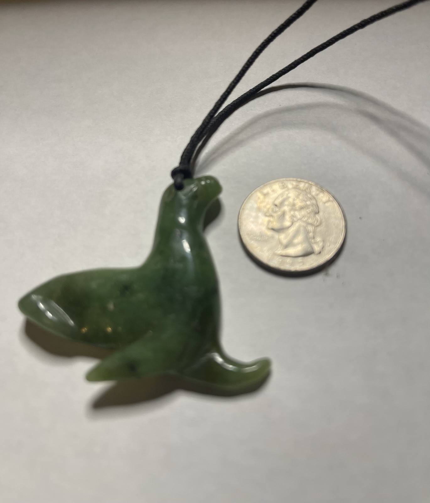 Jade Carved Pendant On A Black Chord