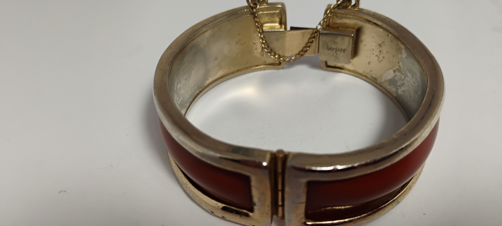 bergere goldtone hinge cuff bracelet inlaid w/soft redish brown material-nd6