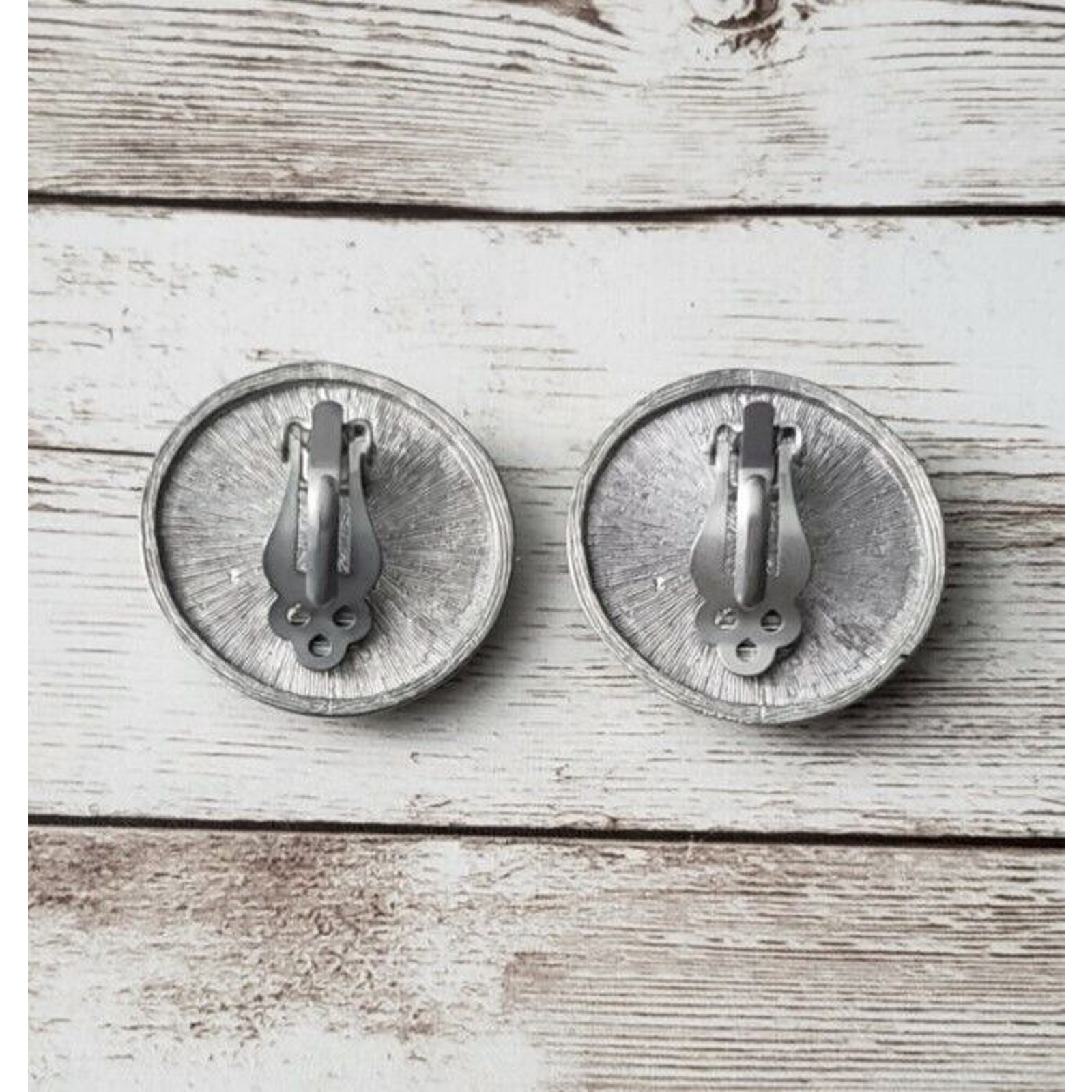 Vintage Clip On Earrings Pushed in Black With Silver Tone Halo