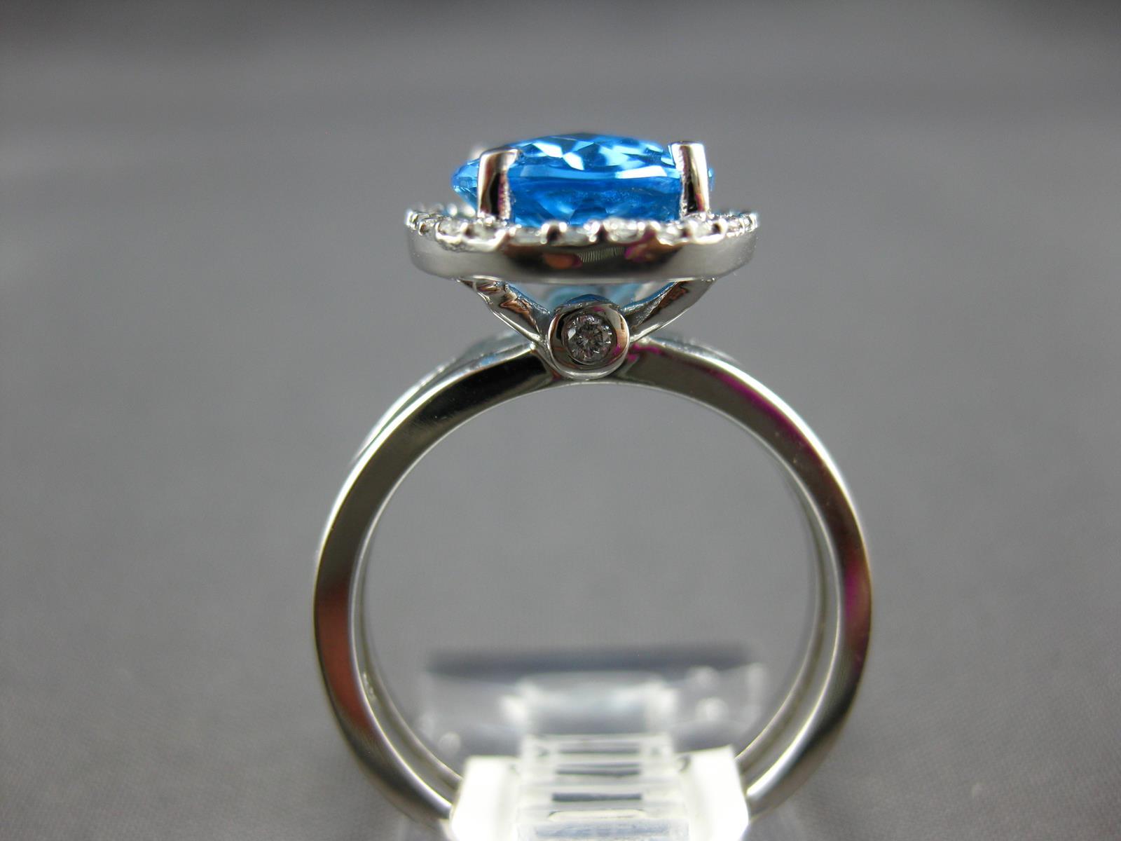 3.58CT DIAMOND & AAA BLUE TOPAZ 14KT WHITE GOLD 3D OVAL & ROUND ENGAGEMENT RING
