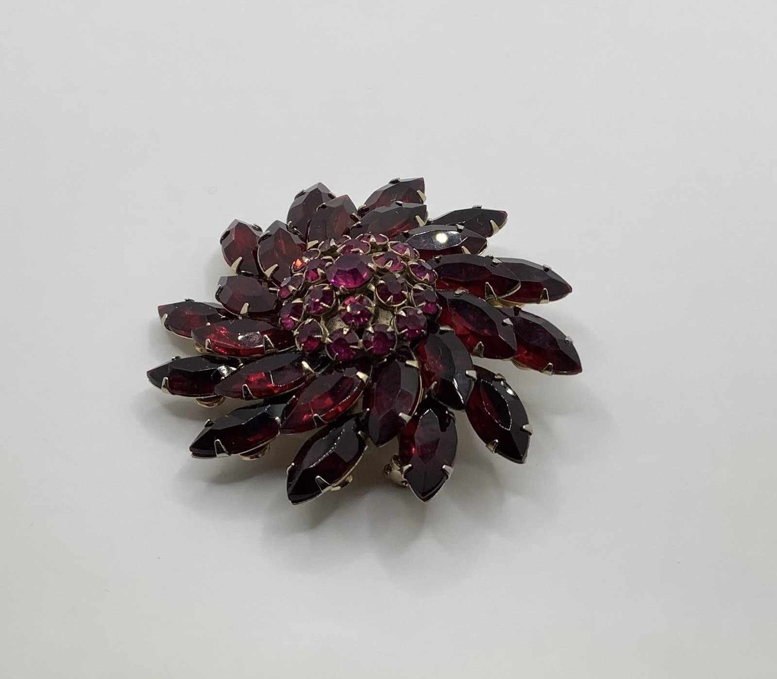 Vintage Gold Tone Riveted Fuchsia & Red Navette Rhinestone Swirl Flower Brooch