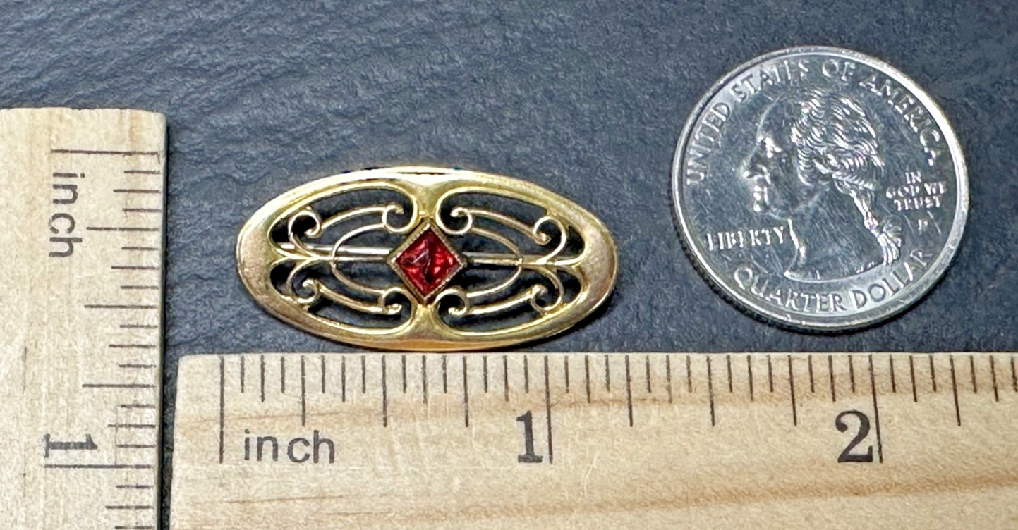 VINTAGE GOLD FILLED? BROOCH WITH SCROLL DETAILS AND RED GLASS ACCENT N829