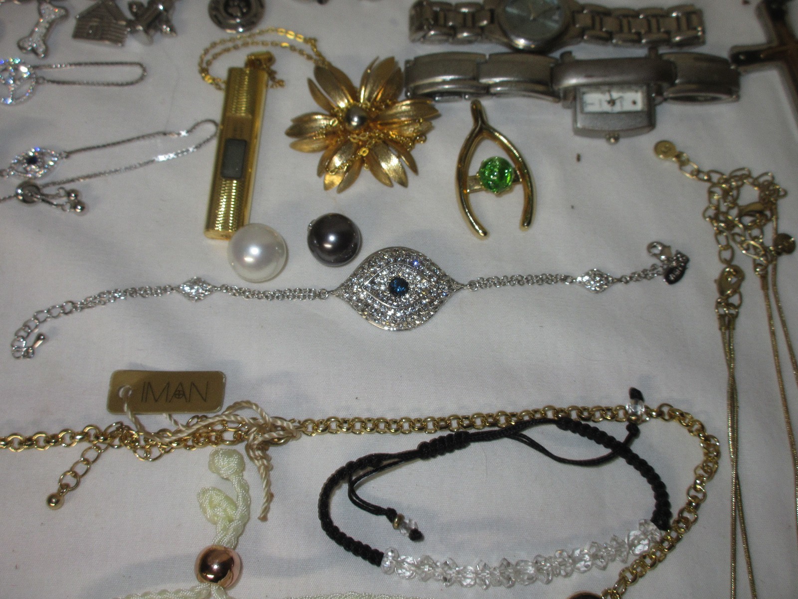 47 Pc. FASHION JEWELRY Bracelets, watches, necklaces, etc.