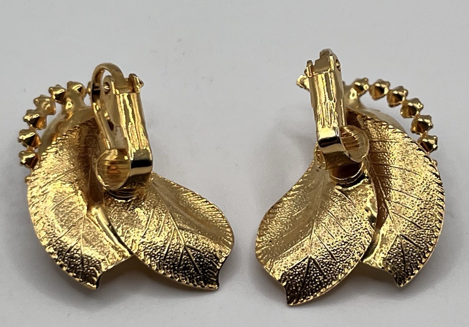 Vintage Rhinestone Clip On Earrings Gold Tone Leaf Vibrant Red And Clear Stones