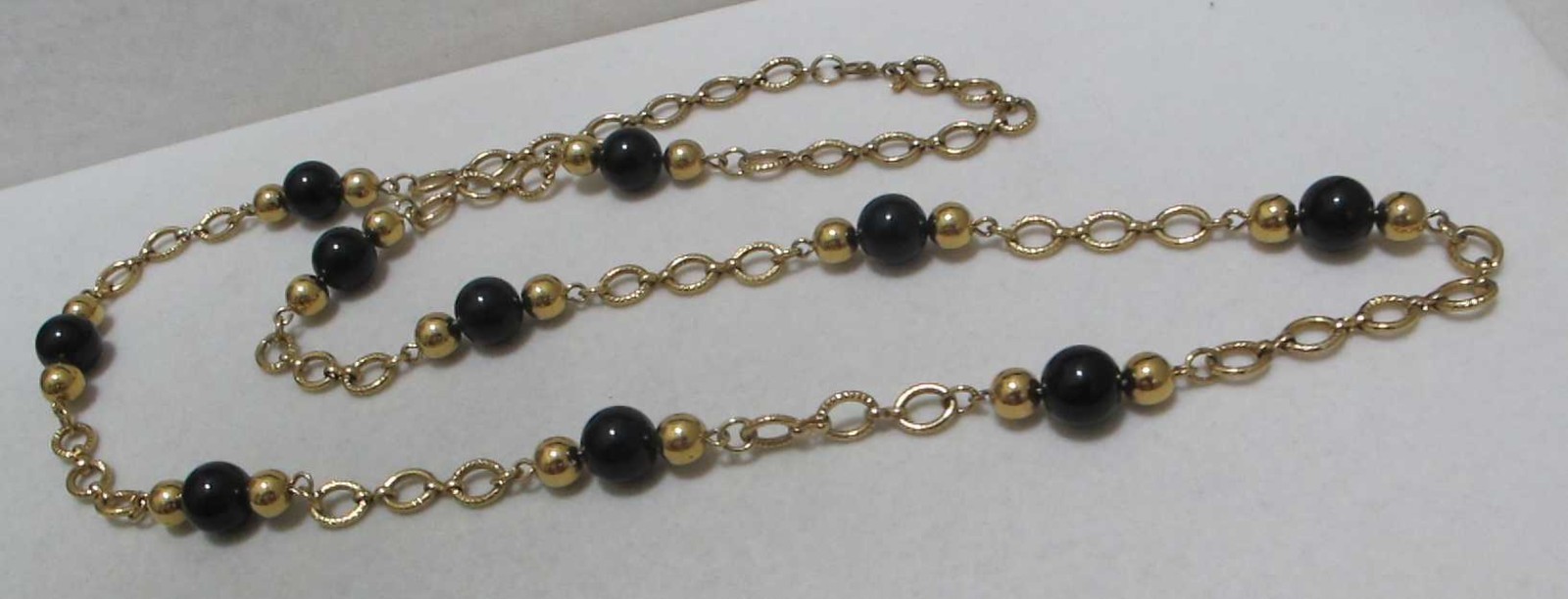 Vintage MONET Gold Tone Oval Links Black Bead Sister Clasp 34” Station Necklace