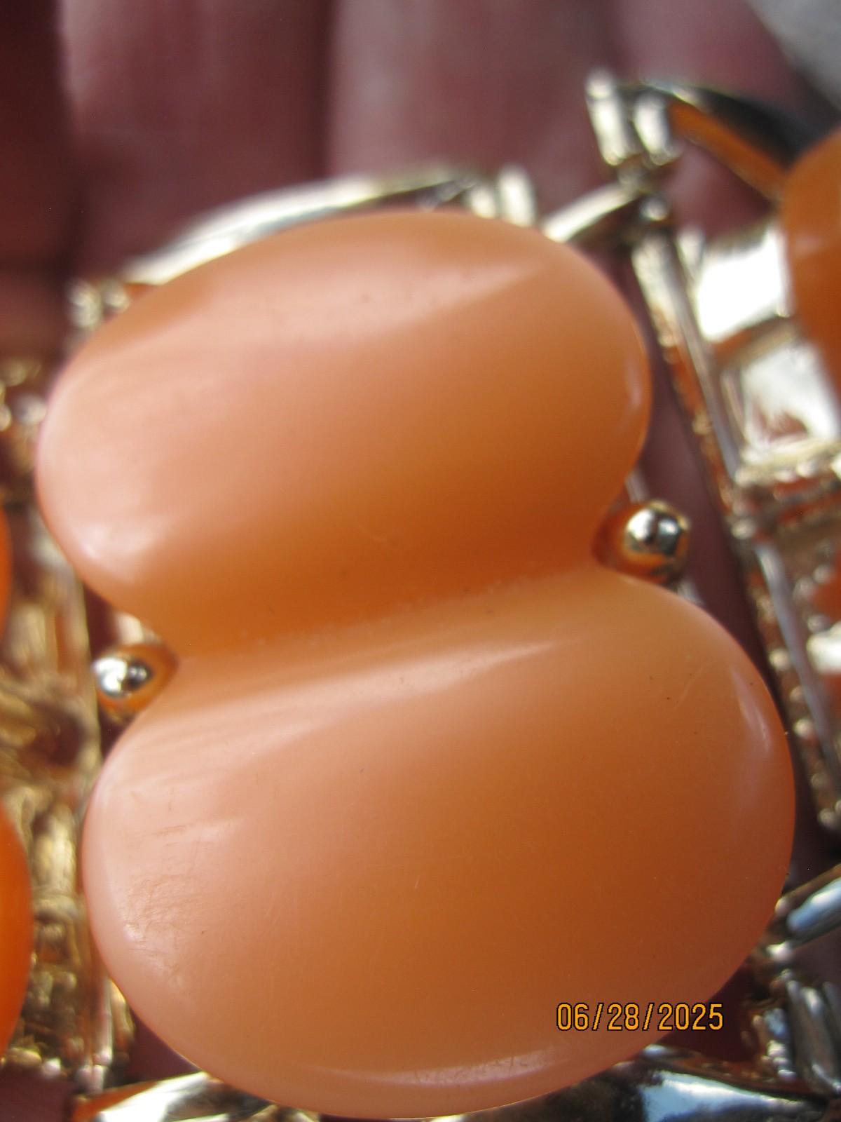Vintage Bracelet unknown metal with orange faux stone Marked DAM