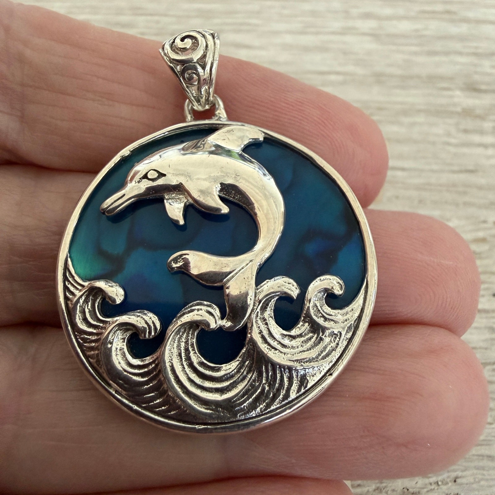 Sterling Silver Dolphin Pendant with Blue Abalone Shell Backing