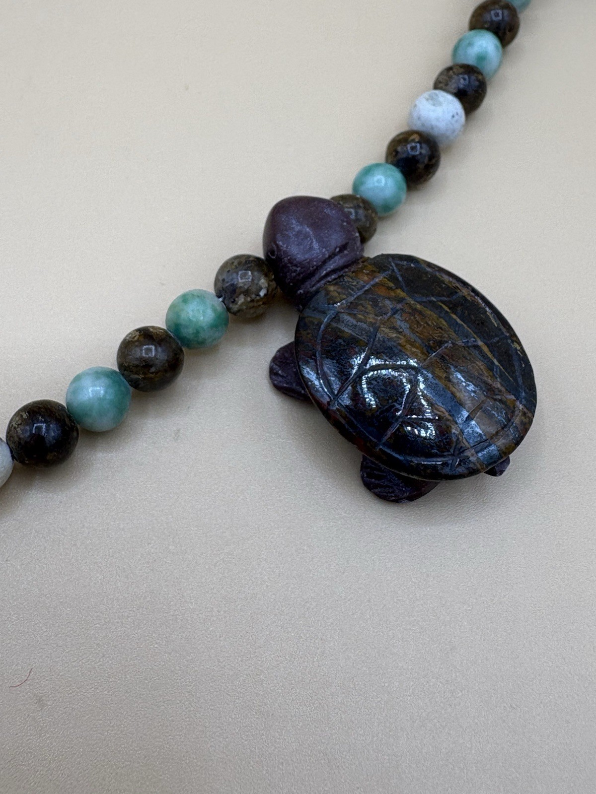 Assorted Color Stone Bead Necklace with 5 Carved Turtle Pendants