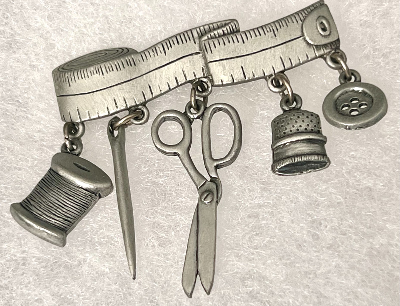 Vintage 80s Sewing Brooch Charms on Tape Measure Signed JJ Silver Tone Lapel Pin