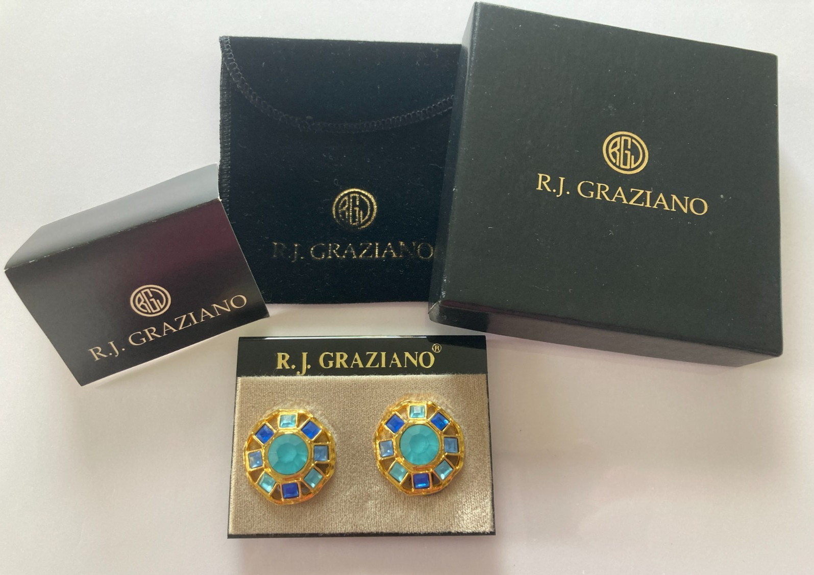 R.J. Graziano Clip on Earrings Blue Stones in Gold Color Setting