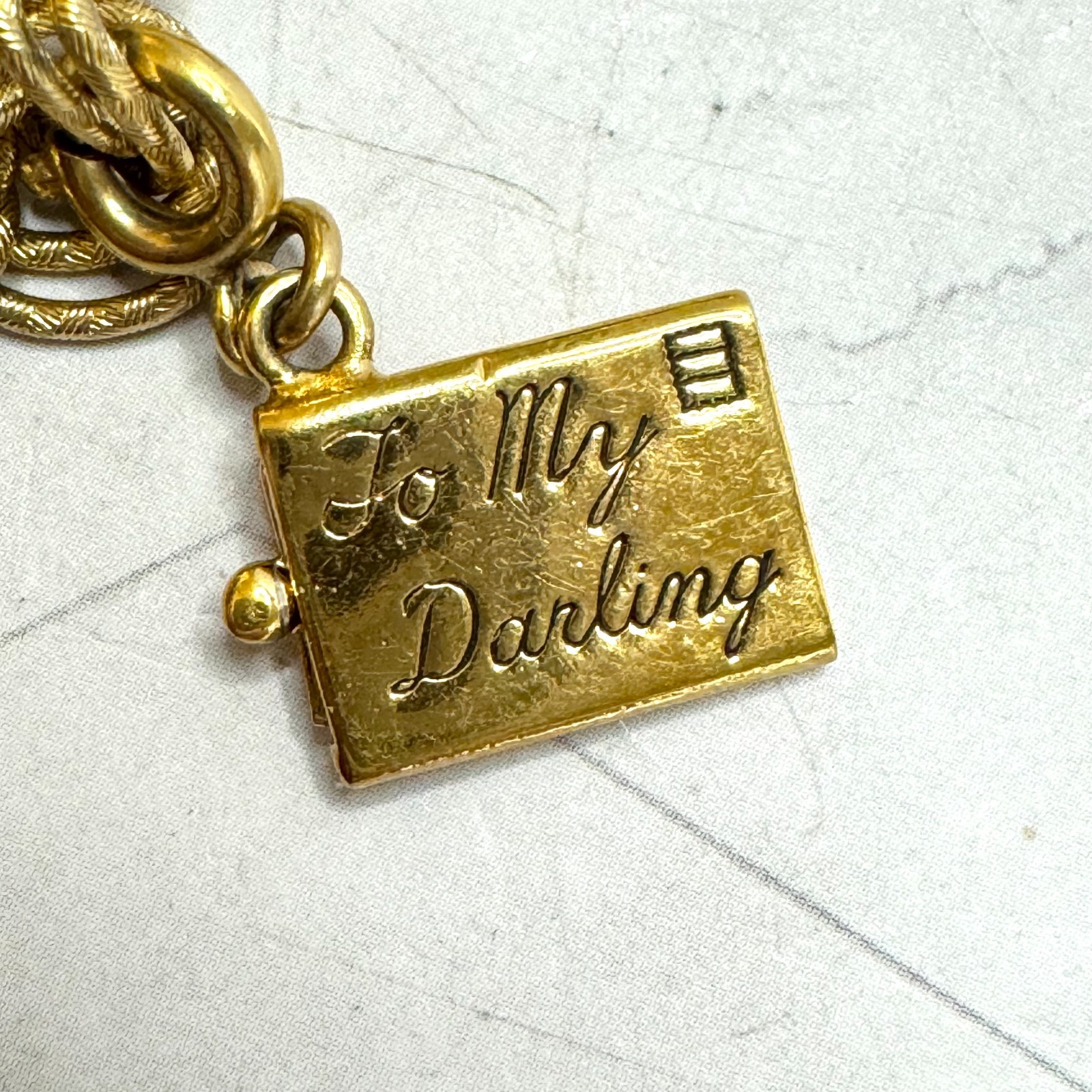 Vintage Monet Charm Bracelet Gold Tone Double Link 6 Charms Globe Kitten Cross