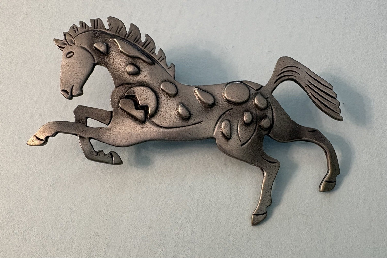 Nice Appaloosa Horse Brooch / Pin. Approximately 3″ x 2″. Possibly Pewter.