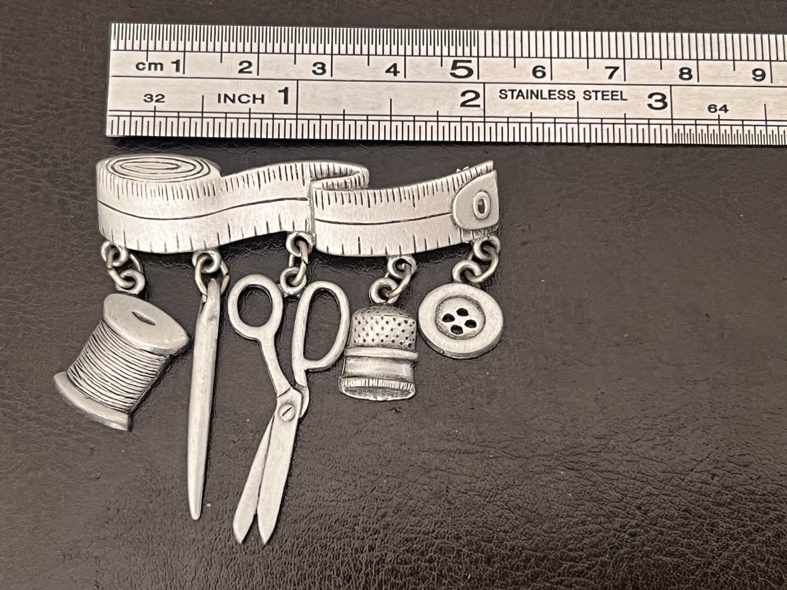 Vintage 80s Sewing Brooch Charms on Tape Measure Signed JJ Silver Tone Lapel Pin