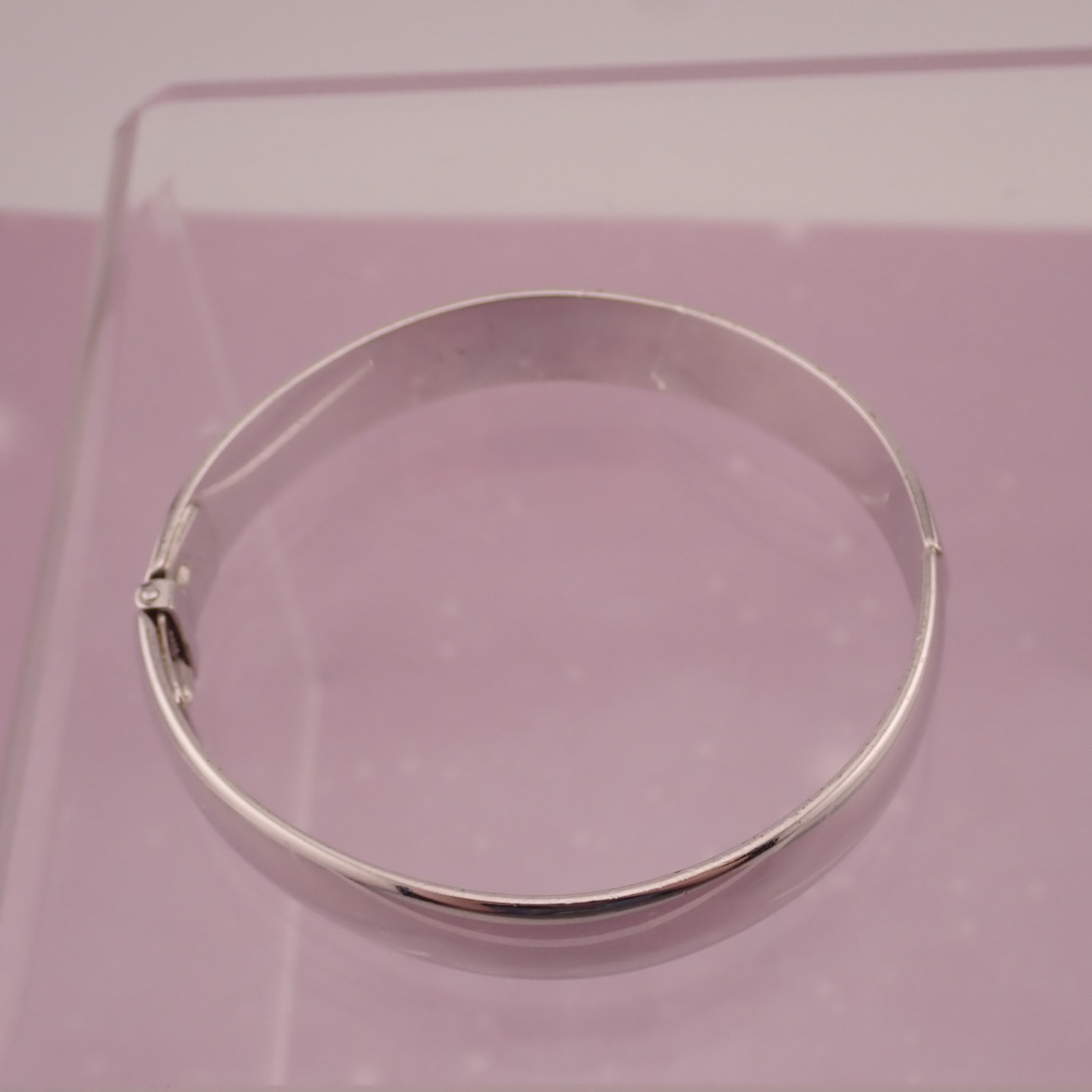 Vintage Shiny Monet Silver Tone 6 1/2″ Hinged Tension 10mm Bangle Bracelet