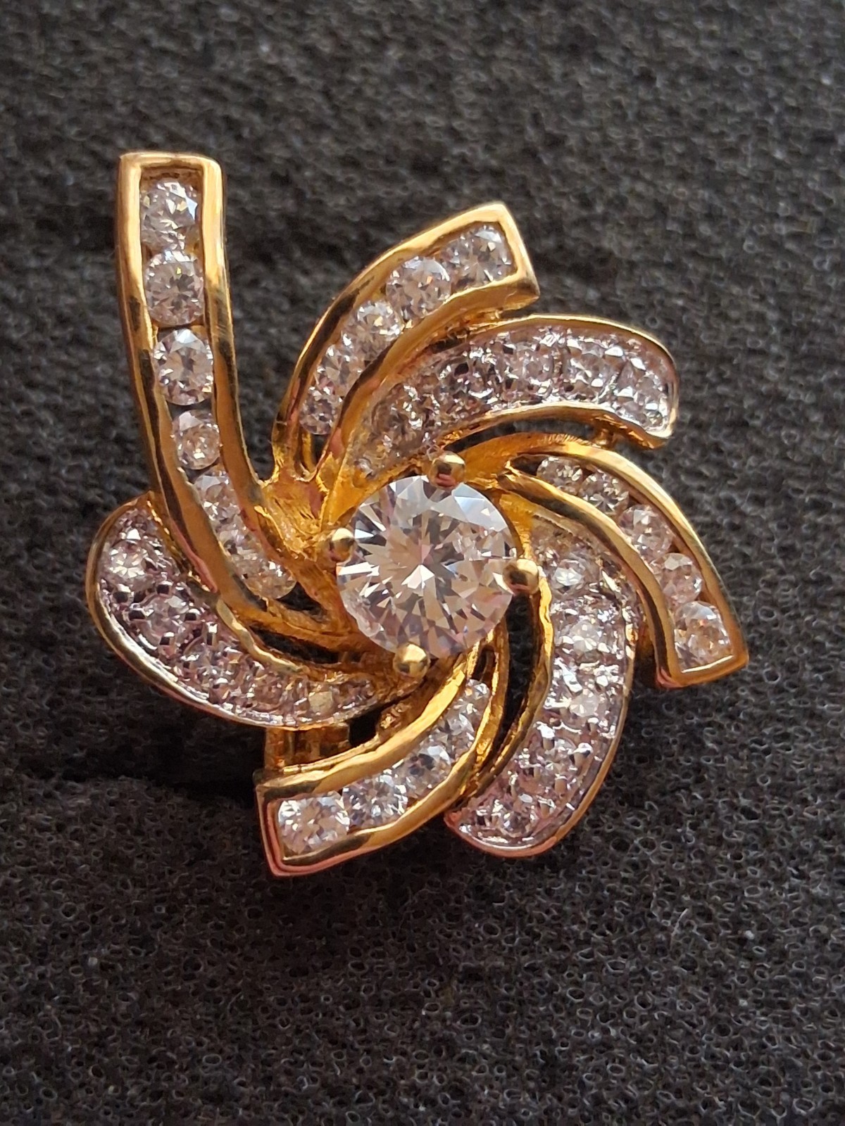 Pinwheel cubic zirconia embellished gold plated convertible brooch/pendant
