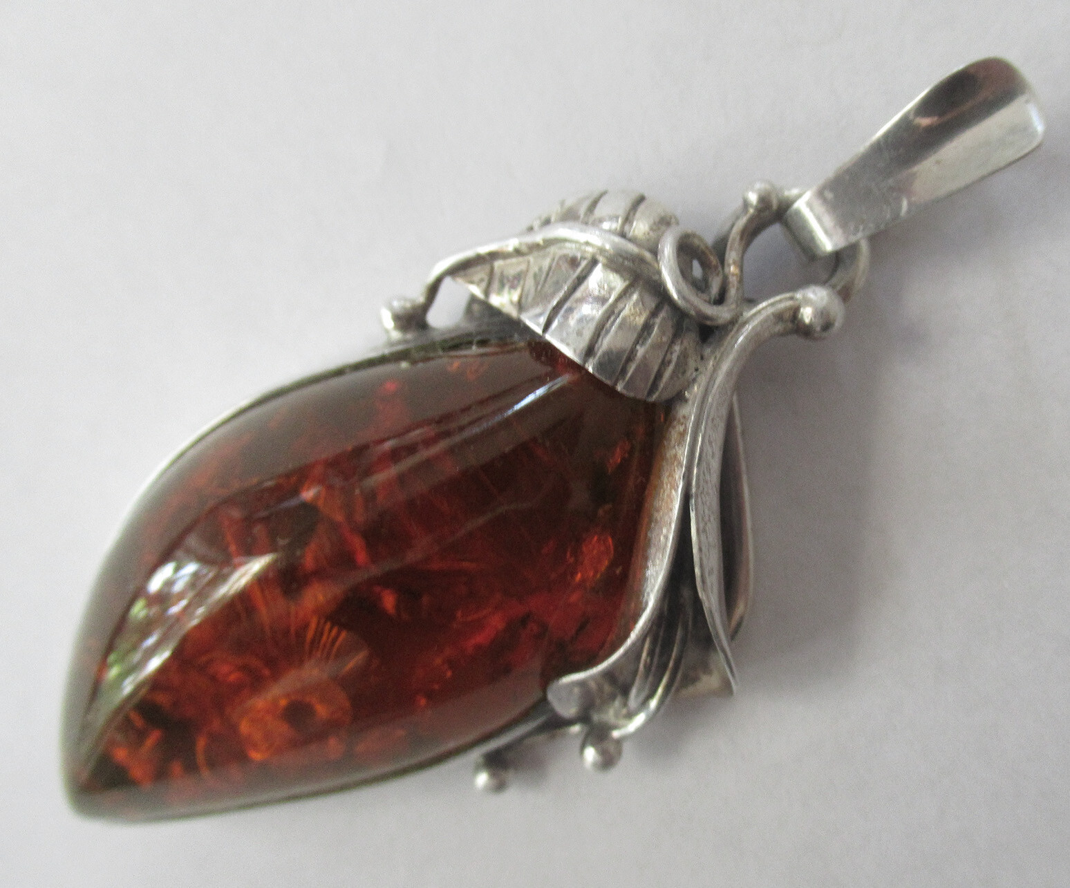 STERLING & AMBER PENDANT -2 3/8 INCHES, 15 GRAMS