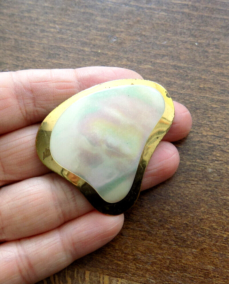 Vintage Mother-of-Pearl Brooch on a gold-colored metal base.