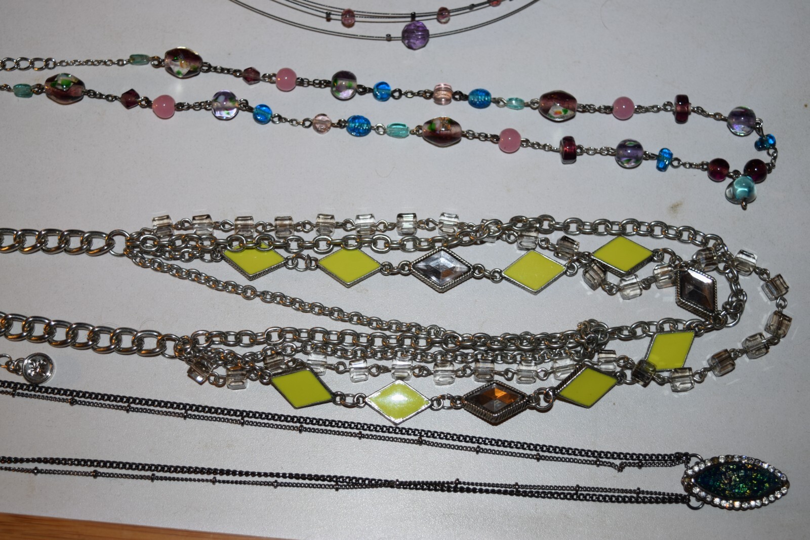 Vintage to now lot of 4-2 VJ-2 not sure of symbol chain necklaces