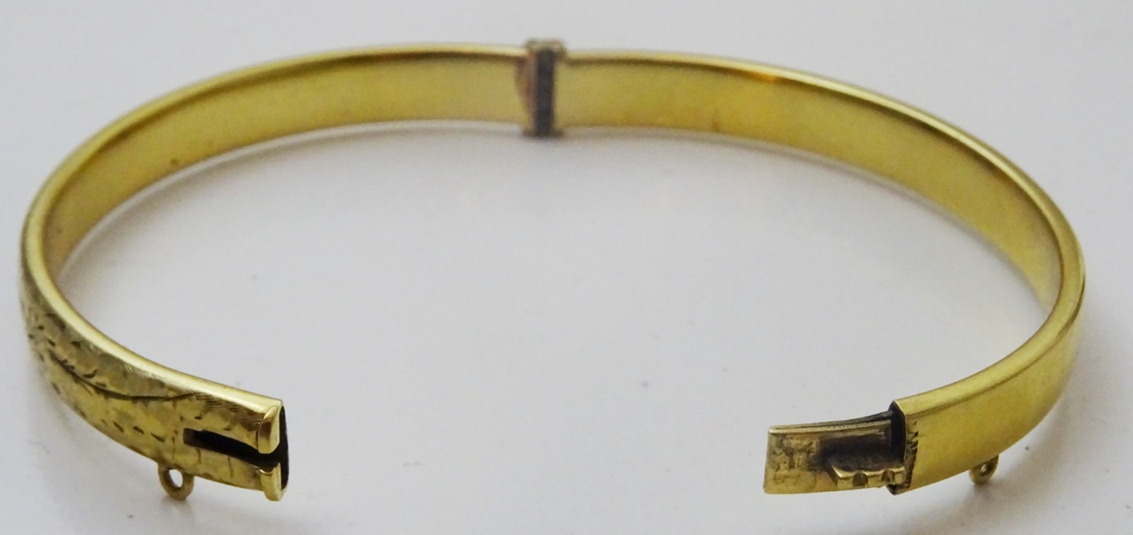 Vintage Hinged 9 karat Gold Bangle with Metal Core
