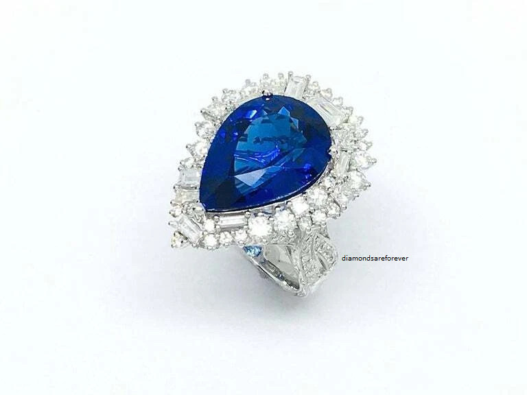 Beautiful Pear Shape 13.24CT Tanzanite & Different Shapes 3CT Shiny CZ Halo Ring