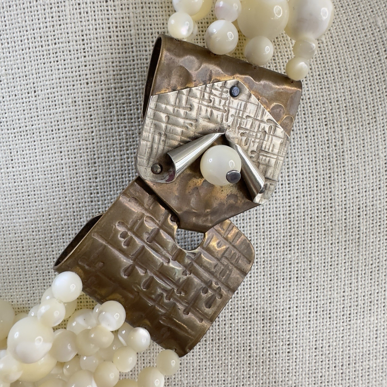 VTG Artisan Necklace Charlene Biesele Mother of Pearl Bead & Repousse Brass 20″