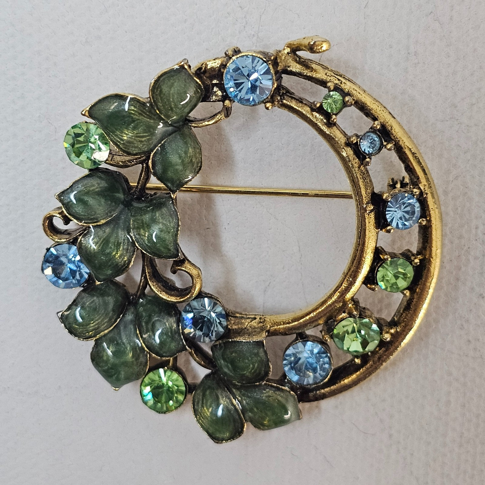 Gold Colored Metal Wreath Brooch Enameled Green Blue Rhinestone Unmarked Pin