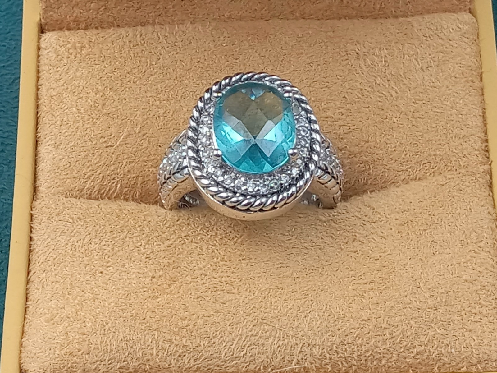 Sterling Silver Ring w. Blue Topaz Oval Center Stone & Clear Trim Stones: Size 6